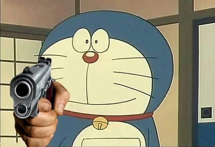 Meme Doraemon cười dí dỏm