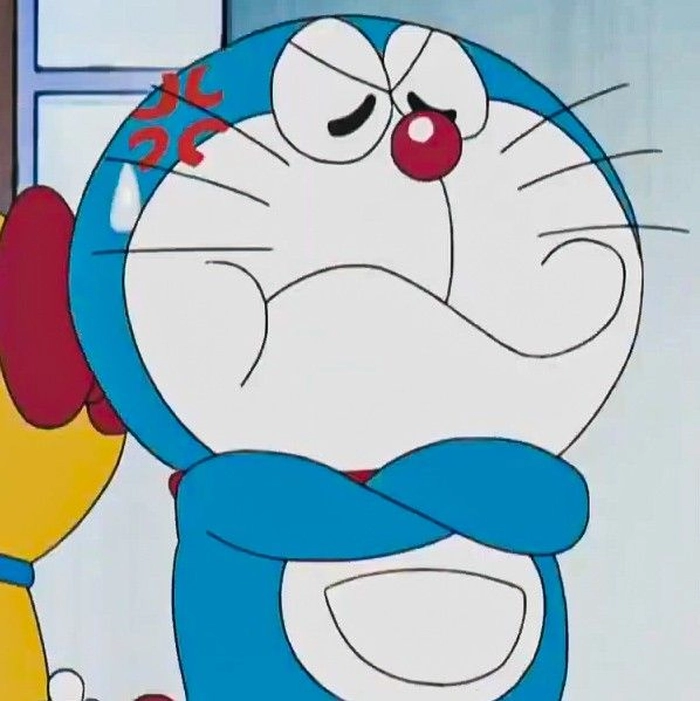 Meme Doraemon giơ ngón giữa hài hước
